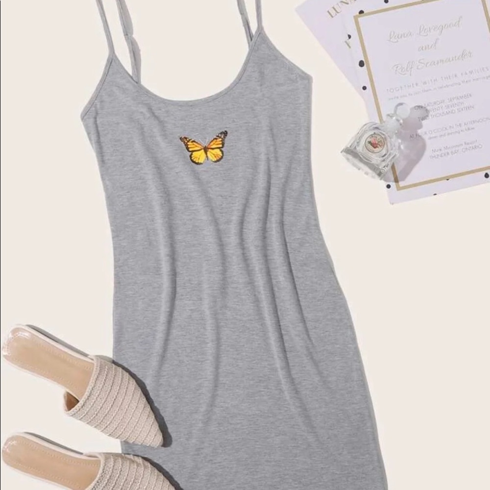 Gray dress with yellow butterfly